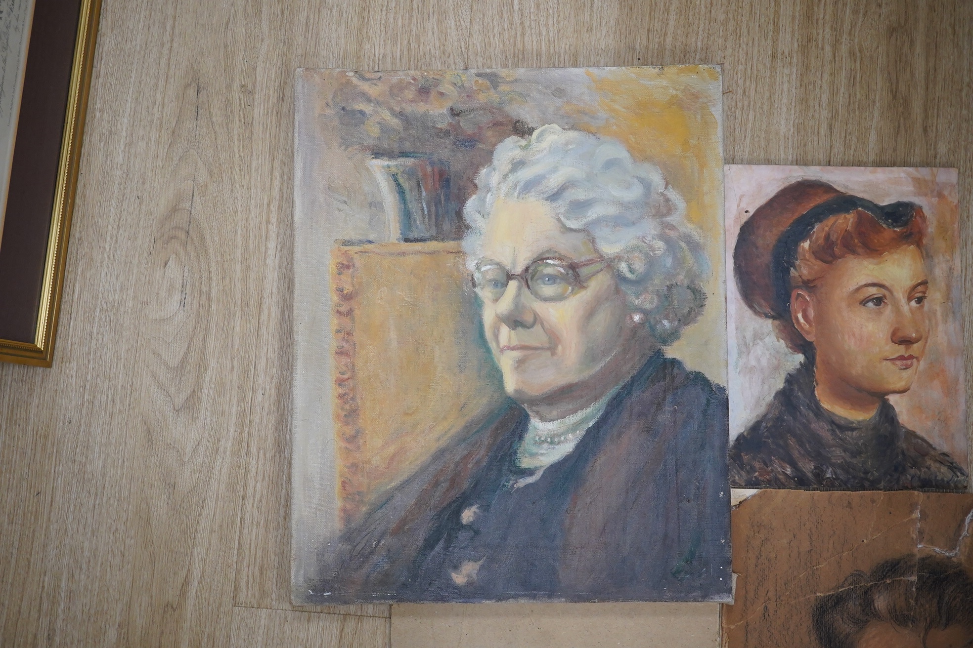 Ernest Waldron West (1904-1994), four works comprising, oil on canvas, Portrait of an elderly lady, two charcoal/pencil sketches on board, Study of a lady and study of a gentleman, possibly self portrait and oil on board